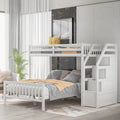 Lit mezzanine double sur lit double en bois avec escalier, balustrades hautes et échelle
