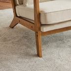 Fauteuil d'appoint rembourré en mélange de lin avec pieds en bois et un oreiller beige