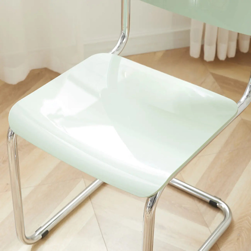 Chaise de salle à manger simple en métal sans accoudoirs, dossier plein, jaune