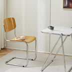 Chaise de salle à manger simple en métal sans accoudoirs, dossier plein, jaune